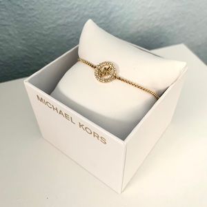 NWT authentic MK gold plated logo slider bracelet